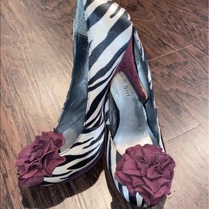 Zebra print heels with maroon rose detail